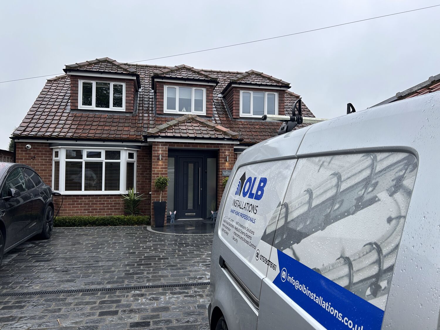 OLB Installations van at a project